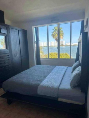 Prime Lagoonfront Apt in Hotel Zone - Walk to Beaches & Nightlife
